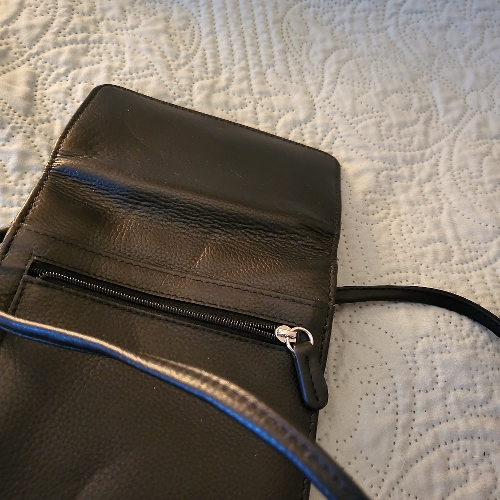 Wallet with a strap.